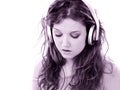 Beautiful Teen Girl with Headphones and Laptop