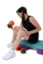 Beautiful Teen Girl Holding Colorful Weights Over White Royalty Free Stock Photo