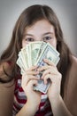 Beautiful teen girl holding money Royalty Free Stock Photo