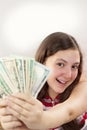 Beautiful teen girl holding money Royalty Free Stock Photo