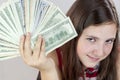 Beautiful teen girl holding US dollars Royalty Free Stock Photo