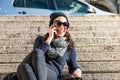 Beautiful teen girl leaned back and talking on the phone Royalty Free Stock Photo