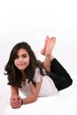 Beautiful teen girl lying on floor relaxing Royalty Free Stock Photo