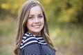 Beautiful teen girl portrait outdoors. Smiling and looking at the camera Royalty Free Stock Photo