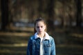 Beautiful teen girl portrait in a pine Park.