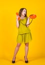 beautiful teen girl with retro phone. kid vintage fashion. happy childhood. cute child on yellow background. new Royalty Free Stock Photo