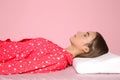 Beautiful teen girl sleeping with orthopedic pillow on bed Royalty Free Stock Photo