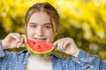 Beautiful teen girl smiling with watermelon and dental care orthodontic treatment teeth aligning with braces or aligners Royalty Free Stock Photo