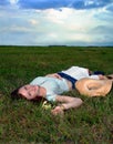 Beautiful teen relaxing in field Royalty Free Stock Photo