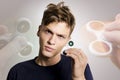 Beautiful teenage boy holding fidget spinner Royalty Free Stock Photo