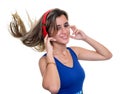 Beautiful teenage girl listening to music on with her hair float Royalty Free Stock Photo