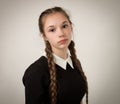 Beautiful Teenage Girl With Plaits Dressed In Black