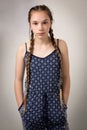 Beautiful Teenage Girl With Plaits and Onesie Royalty Free Stock Photo