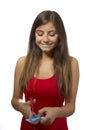 Beautiful teenage girl portrait excited cutting credit card