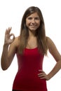 Beautiful teenage girl portrait gesturing ok sign