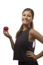 Beautiful teenage girl portrait holding one red apple Royalty Free Stock Photo