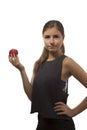 Beautiful teenage girl portrait holding one red apple Royalty Free Stock Photo