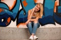 Beautiful teenage girl speaks on a cell phone outdoors Royalty Free Stock Photo