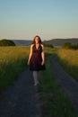 Beautiful teenage girl walking barefoot Royalty Free Stock Photo