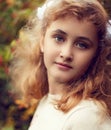 Beautiful teenage girl 10 years old, adorable face looking strai