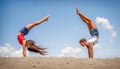 Beautiful teenage girls dancing and jumping on the beach Royalty Free Stock Photo