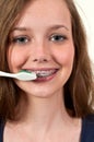 Beautiful Teenage Woman Brushing Teeth