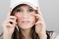 Beautiful Teenager Girl in a White Baseball Cap Royalty Free Stock Photo