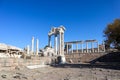 Beautiful temple of Trajan with white marble columns on blue sky background, ancient city Pergamon, Turkey Royalty Free Stock Photo