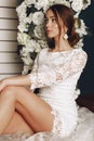 Beautiful tender bride in elegant lace wedding dress