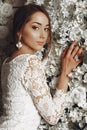 Beautiful tender bride in elegant lace wedding dress