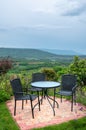 Beautiful terrace lounge with mountain view in rain season Royalty Free Stock Photo