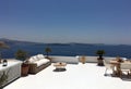 A beautiful terrace in Santorini with spectacular view of sea Royalty Free Stock Photo