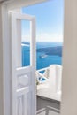 Santorini island, Greece. White gate with sea view. Famous travel destination, luxury greek resort. Royalty Free Stock Photo