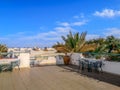 Beautiful terrace with tables on the roof of the hotel in Sharm El Sheikh Egypt. Exotic patio landscape with large clay amphora Royalty Free Stock Photo