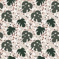 Beautiful terrazzo seamless pattern with monstera, cheese plant leaves. Decorative stone texture. Repeating tile, summer Royalty Free Stock Photo