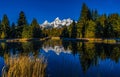 The Beautiful Tetons Covered in Snow Reflecting on a Calm River Royalty Free Stock Photo