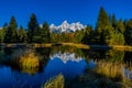 The Beautiful Tetons Covered in Snow Reflecting on a Calm River Royalty Free Stock Photo