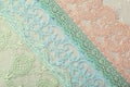 Beautiful laces on a shabby background, a textile product with an ornamental design, light transparent mesh patterned fabric