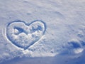 Beautiful texture of snow cover and heart