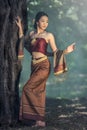 Beautiful Thai girl in Thai traditional costume