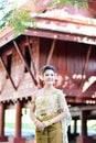 Beautiful Thai girl in Thai traditional costume