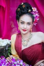 Beautiful Thai girl in traditional dress costume in Choeng Tha a Royalty Free Stock Photo