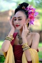 Beautiful Thai girl in traditional dress costume in Choeng Tha a Royalty Free Stock Photo