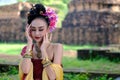 Beautiful Thai girl in traditional dress costume in Choeng Tha a Royalty Free Stock Photo