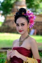 Beautiful Thai girl in traditional dress costume in Choeng Tha a Royalty Free Stock Photo