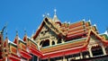 Beautiful Thai temple soars into blue sky