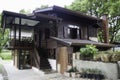 Beautiful Thai vintage style house and tropical garden Royalty Free Stock Photo