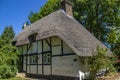 Beautiful thatched cottage in the heart of a Dorset village. Royalty Free Stock Photo