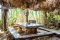 Beautiful Themed Summer Bar with Bamboo Cane and Wood Decoration. Traditional Table and Bench in a Natural Environment