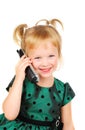 Beautiful three-year-old girl talking on phone. Royalty Free Stock Photo